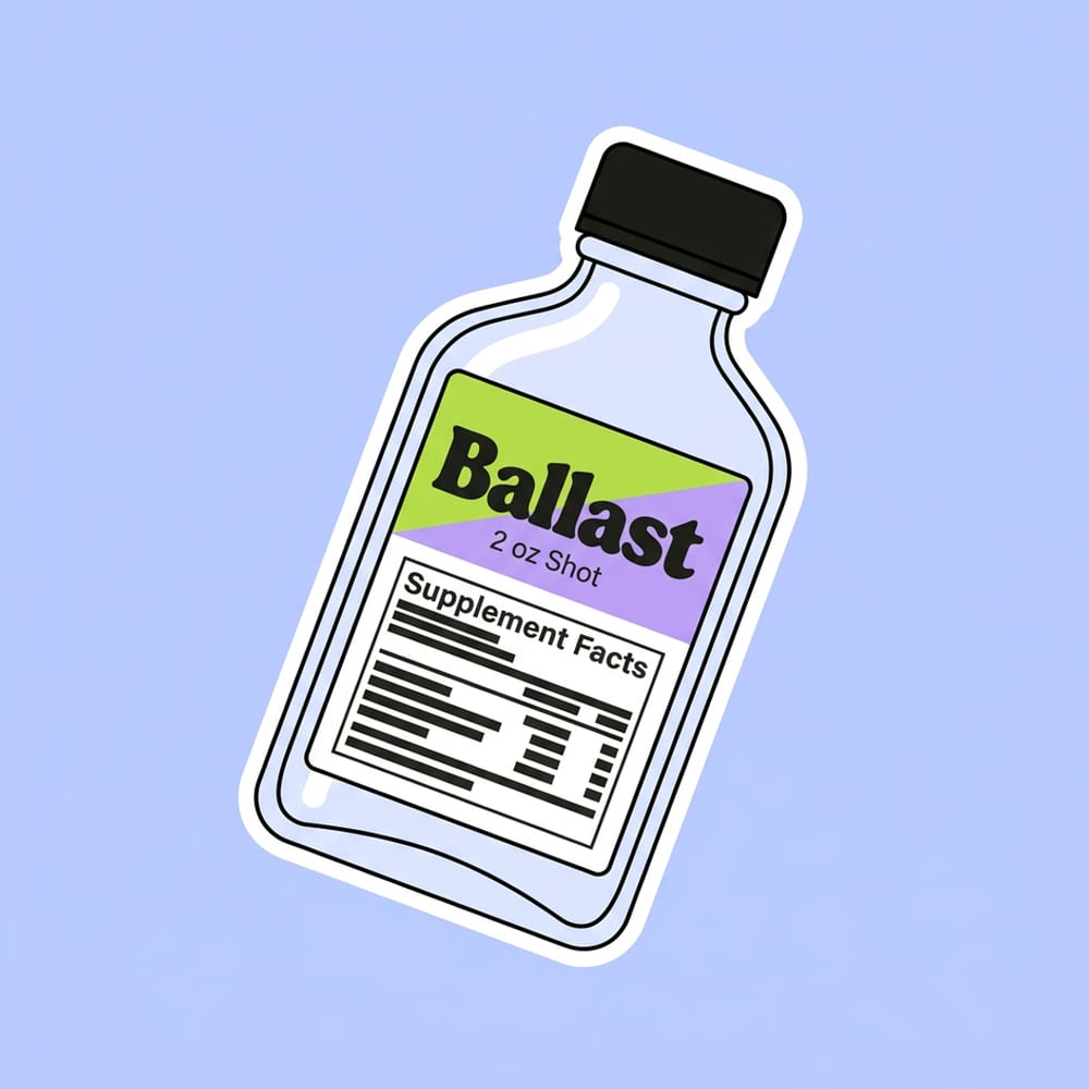 A Ballast 2 oz shot bottle tilted toward you with its label facing out