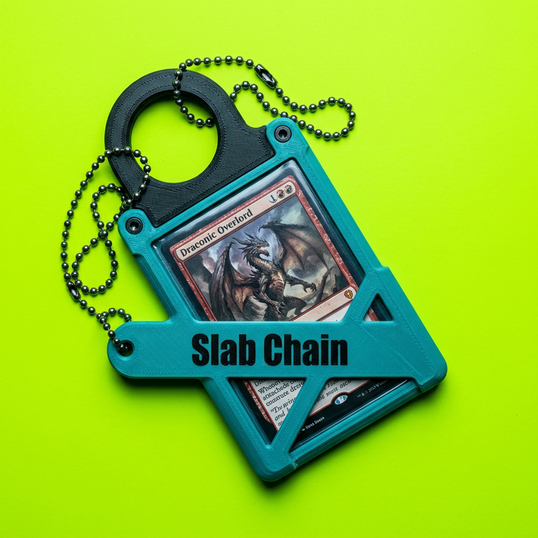 Slab Chain prototype pendant — a card necklace holder with a steel chain, shown against a green background