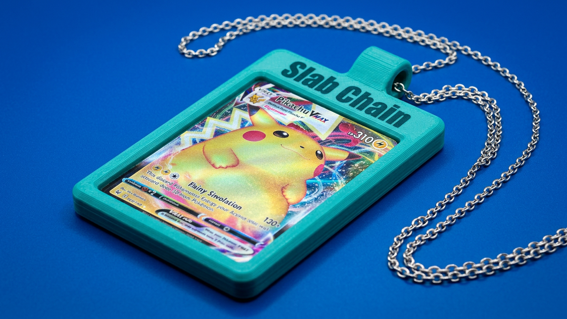 Slab Chain pendant — hard acrylic case holding a Pikachu Vmax card on a silver chain against a blue background
